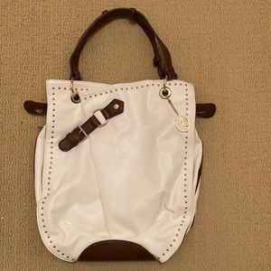 Vieta Faahion white & brown faux leather shoulder bag w/gold grommets & hardware